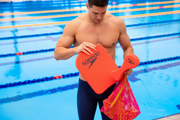 How Using a Kickboard Helps You Swim Faster