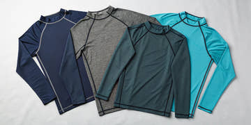 A variety of the best men's long sleeve rashguards for water sports.